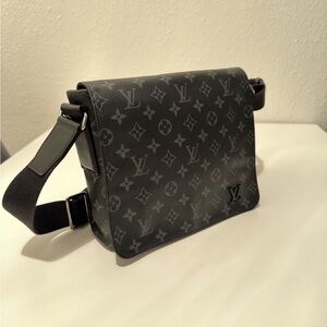 Louis Vuitton Black Messenger Bag with Monogram Design